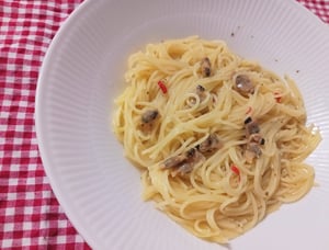 ソースと絡めて完成したパスタの写真